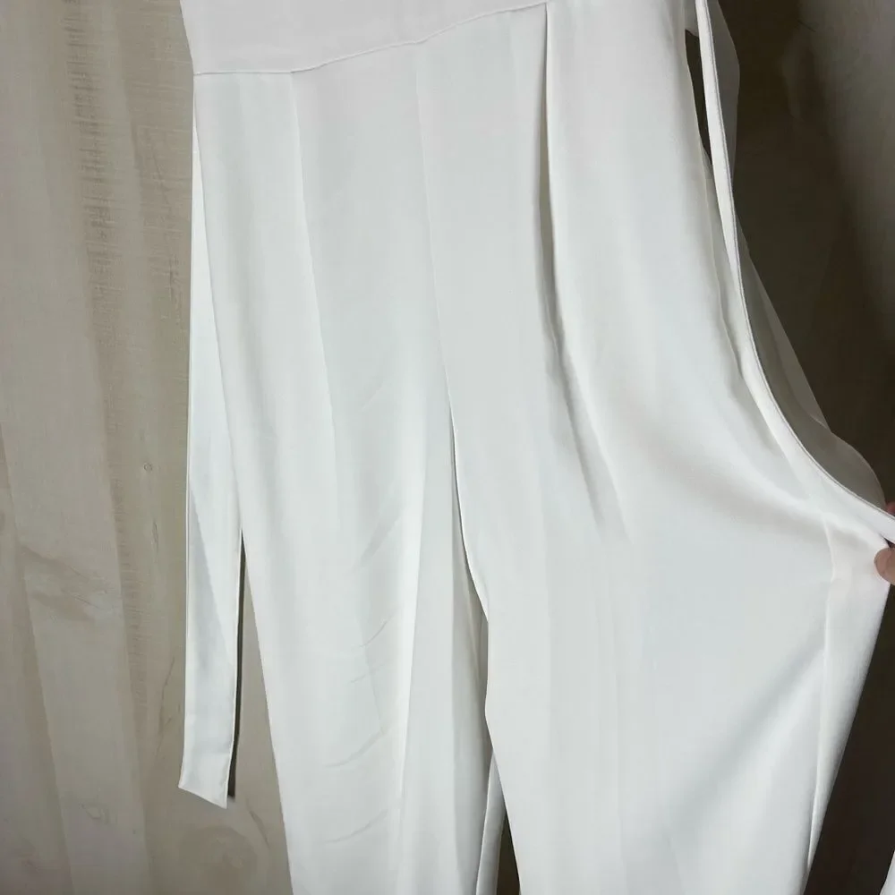 CeCe white sleeveless pants‎ romper v neck, size 2